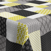 geprägte Wachstischdecke Patchwork mit strukturierter Oberfläche auf Holztisch